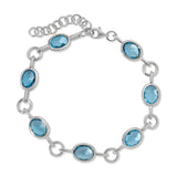 Color Candy Collection Bracelet 13.82 CTW with 7 Oval Shape Blue Topaz 14K Gold Plated Silver