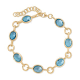 Color Candy Collection Bracelet 13.82 CTW with 7 Oval Shape Blue Topaz 14K Gold Plated Silver