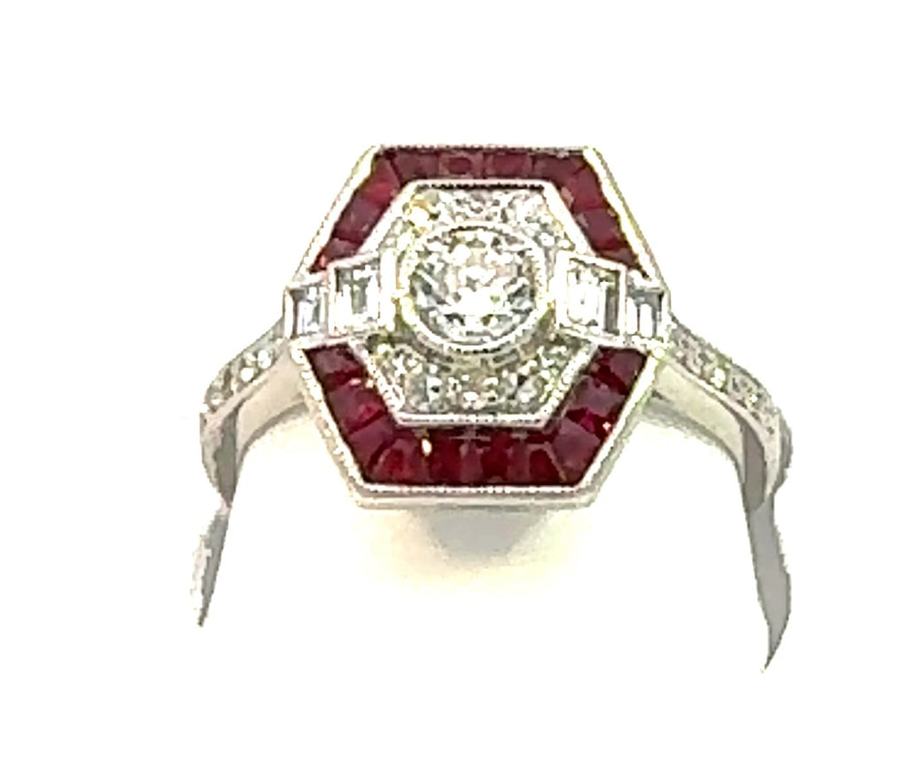 VINTAGE COLLECTION  0.62 CTW / 0.30 CTR  ROUND & 0.32CTS DIA  RD SIDE STONES & 20  RUBY 0.88CTS SET ON  3.27GR 14KWG RING