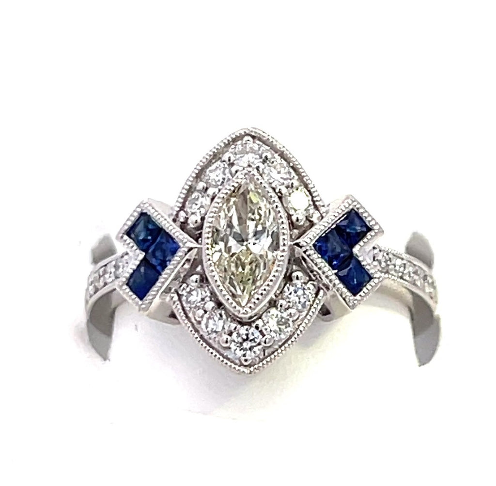 Vintage Collection 0.66CTW 0.36 MQ Center DIA & 6 Pcs Sapphire / 22 Pcs Diamonds sides 5.93 Platinum Ring