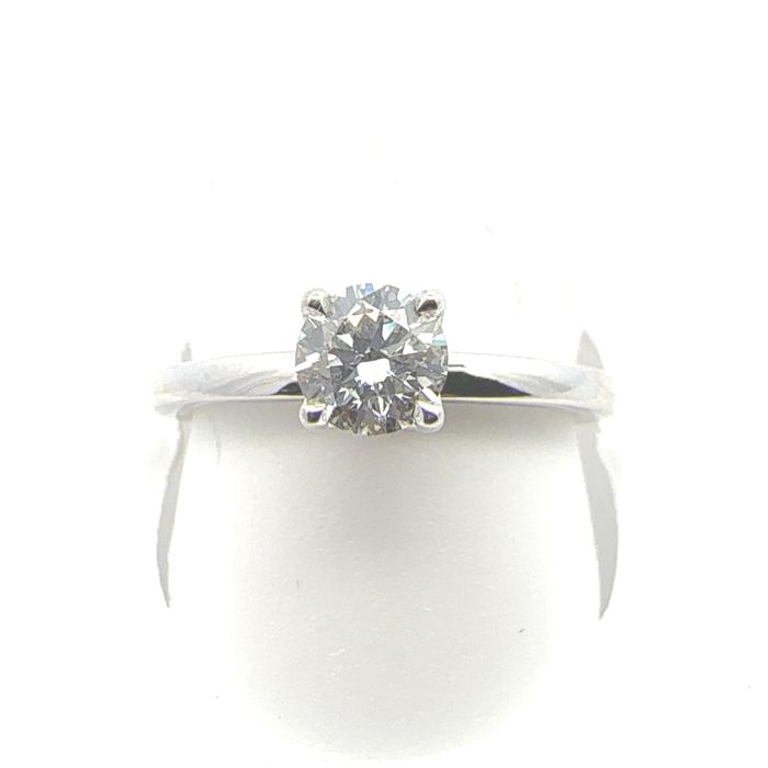 Fireworks Jewelry Rings  0.55   with 0.53  Round Diamond 0.02  Sides set on 3.30gr 18k WG