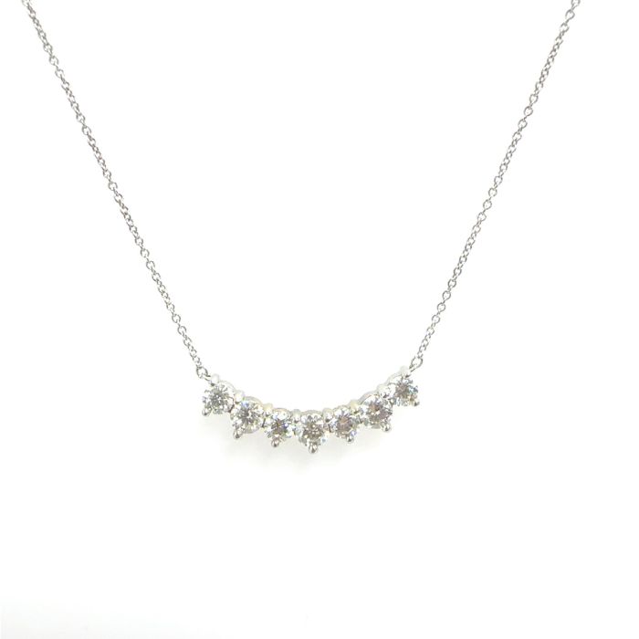 Fireworks Jewelry Pendants  1.51   with 1.51  Round Diamond Sides set on 3.95gr 18k WG