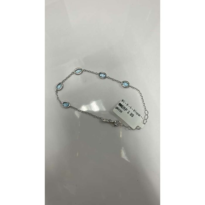 Color Candy Collection Bracelet with 5 pcs 6X4 OV Swiss Blue Topaz set on 2.76 gr SS/14k WG 